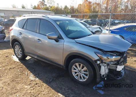 2014 Mazda Cx-5 Touring z USA, uszkodzony, nr VIN JM3KE4CY3E0393283